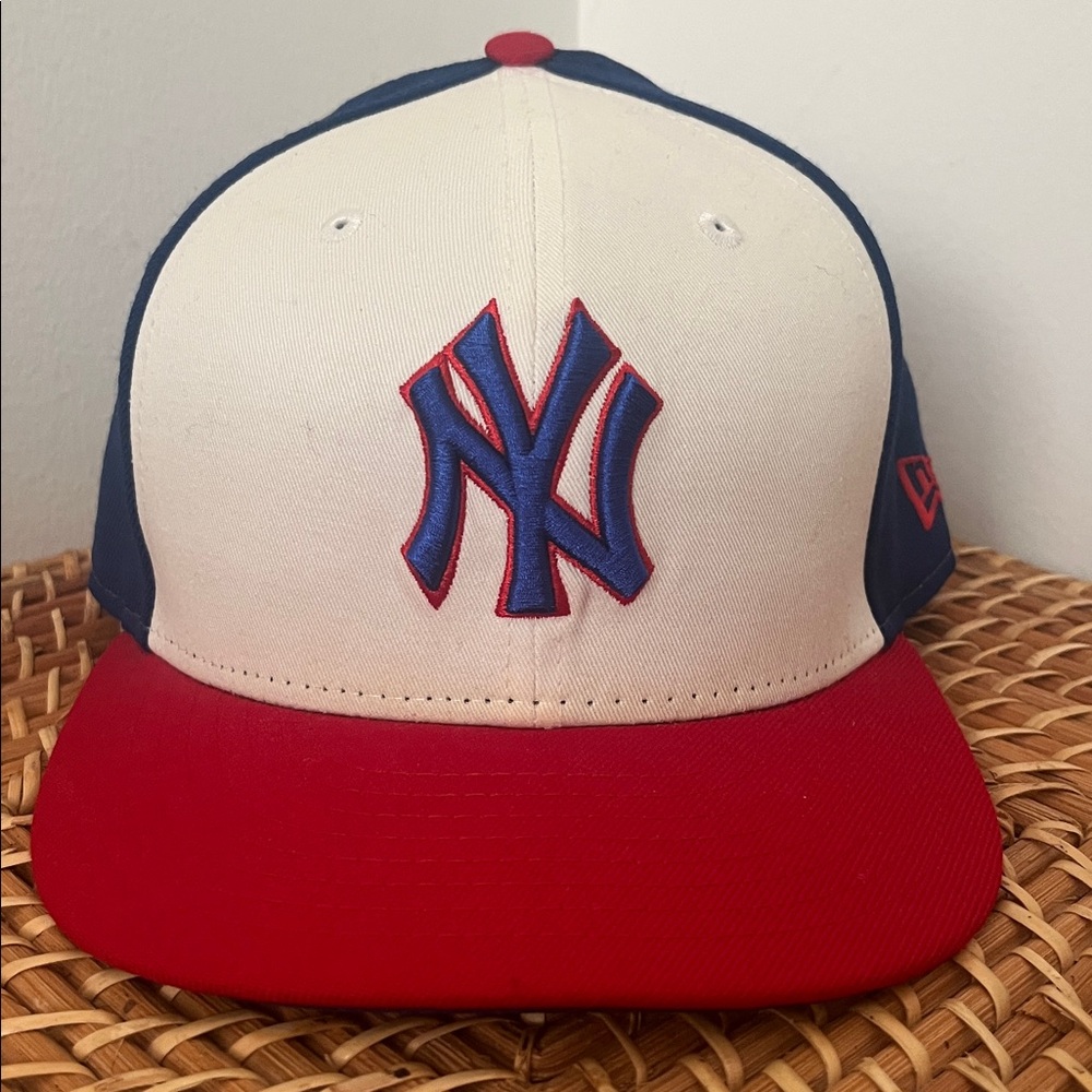 New Era Cream and Red Cap with Blue Logo size: 7 1/4